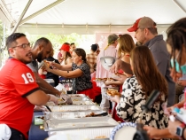 photo of people and food table