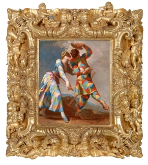 photo of painting of two people, in gold frame