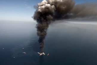 smoking oil rig in the Gulf of Mexico