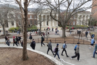 photo of building with students in the foreground 