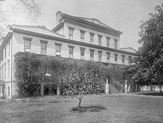 historical black and white photo of a large building