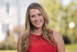 photo of woman with campus background