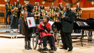 group photo of ensemble, three people in foreground