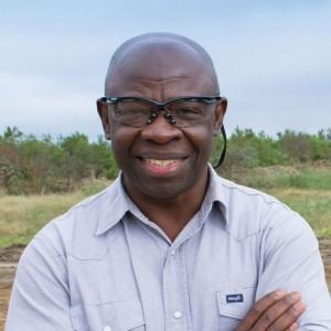 headshot photo of a man outdoors