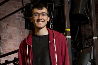 photo of man backstage at a theatre