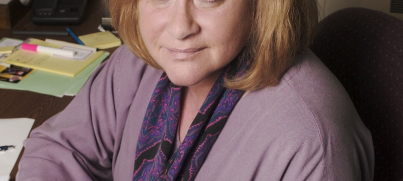 Photo of woman at desk