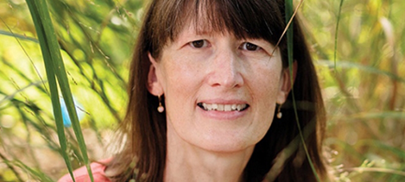 photo of woman with plants outside