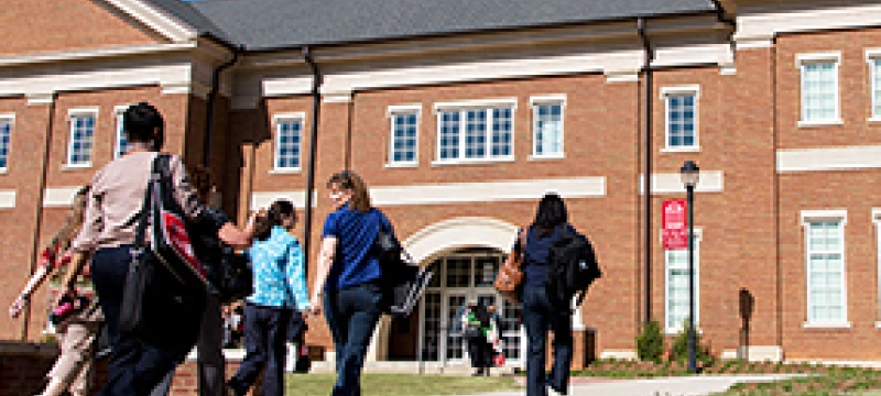 people walking, building
