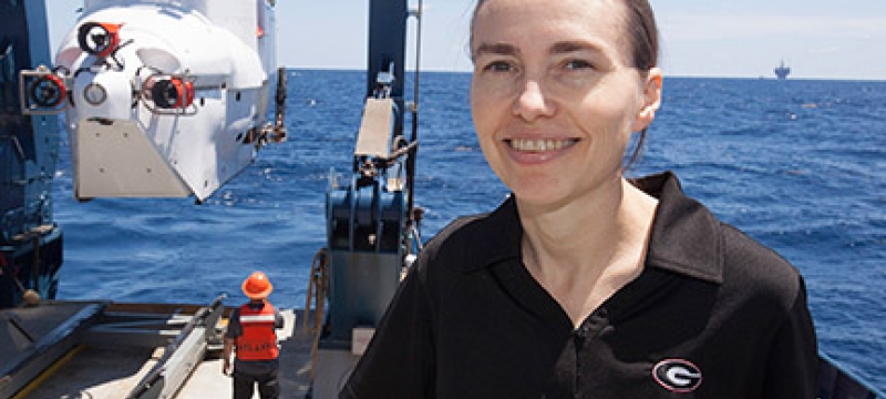 woman at sea on research vessel