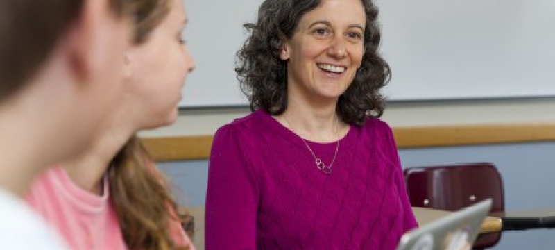 woman in classroom with students