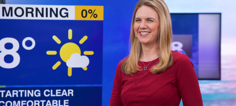 screenshot photo of woman with weather graphic in background