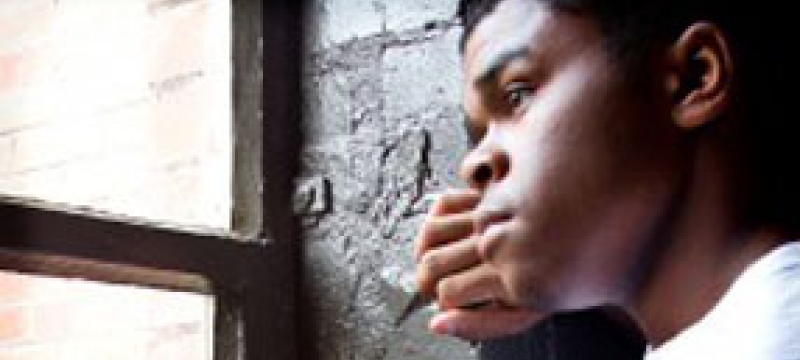 man at window