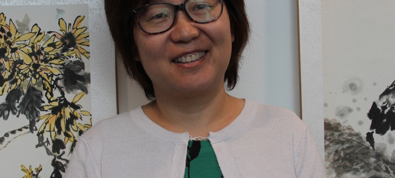 Photo of woman with flower prints