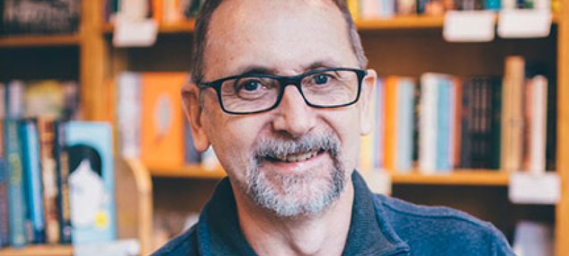 photo of man in bookstore