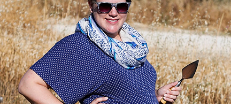 pregnant woman with trowel