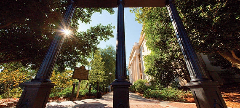 stretched photo of UGA arch day
