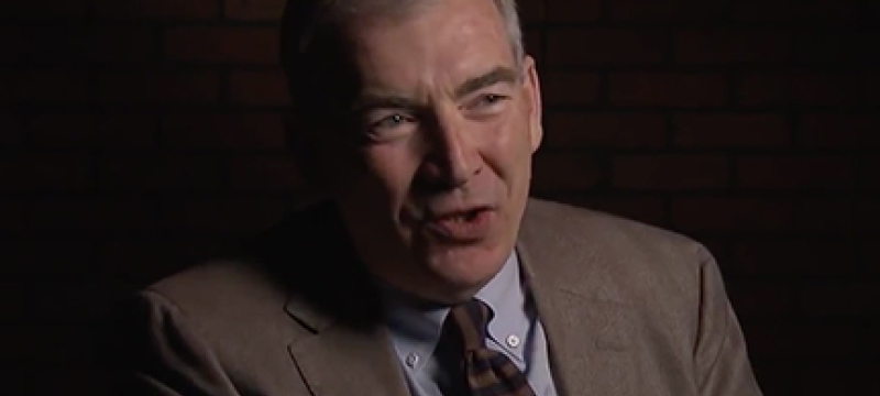 still photo of man talking
