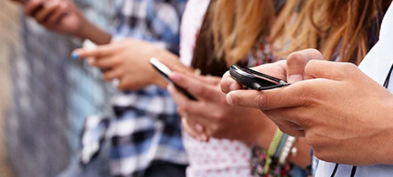 cropped photo of people using smart phones