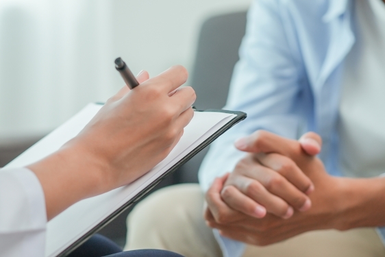 photo of hands with clipboard