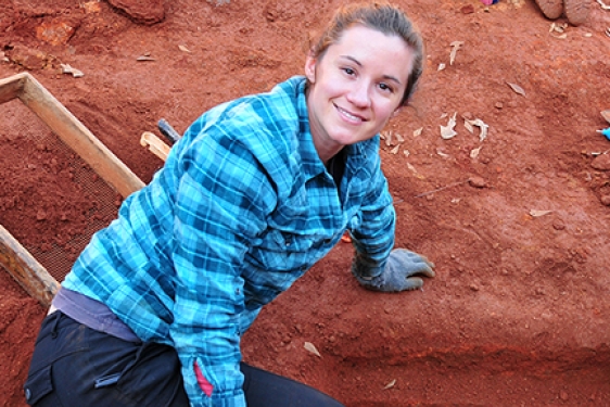 woman on archeological dig