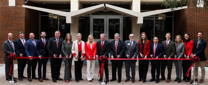group photo of ribbon cutting, day