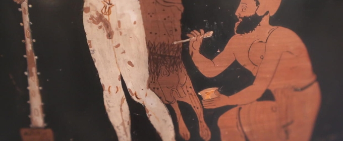 photo of a painting on an ancient vase