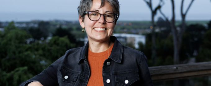 photo of woman, distance in background, day