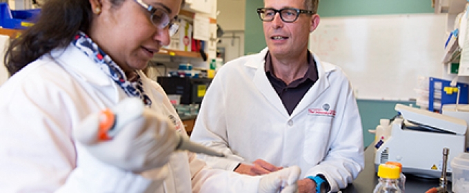 man and woman in lab